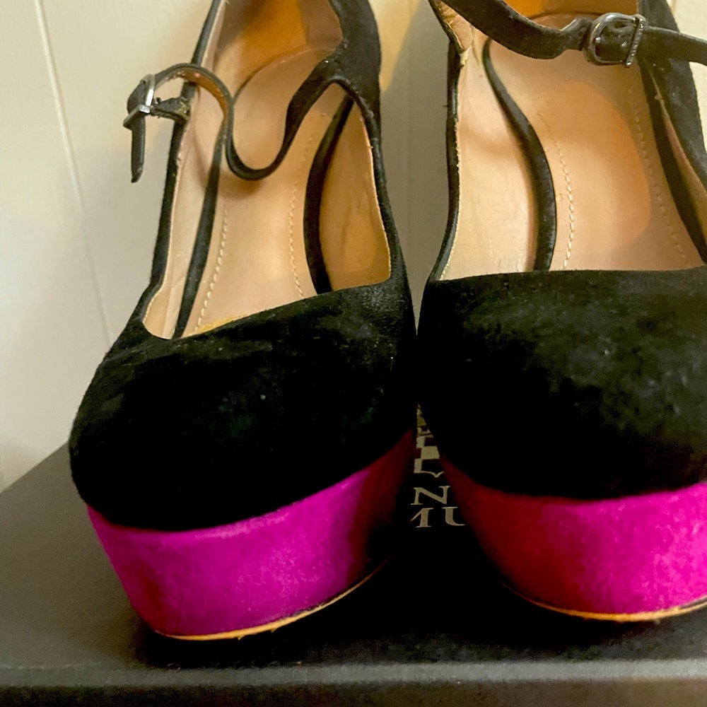 Black and pink suede platform pumps